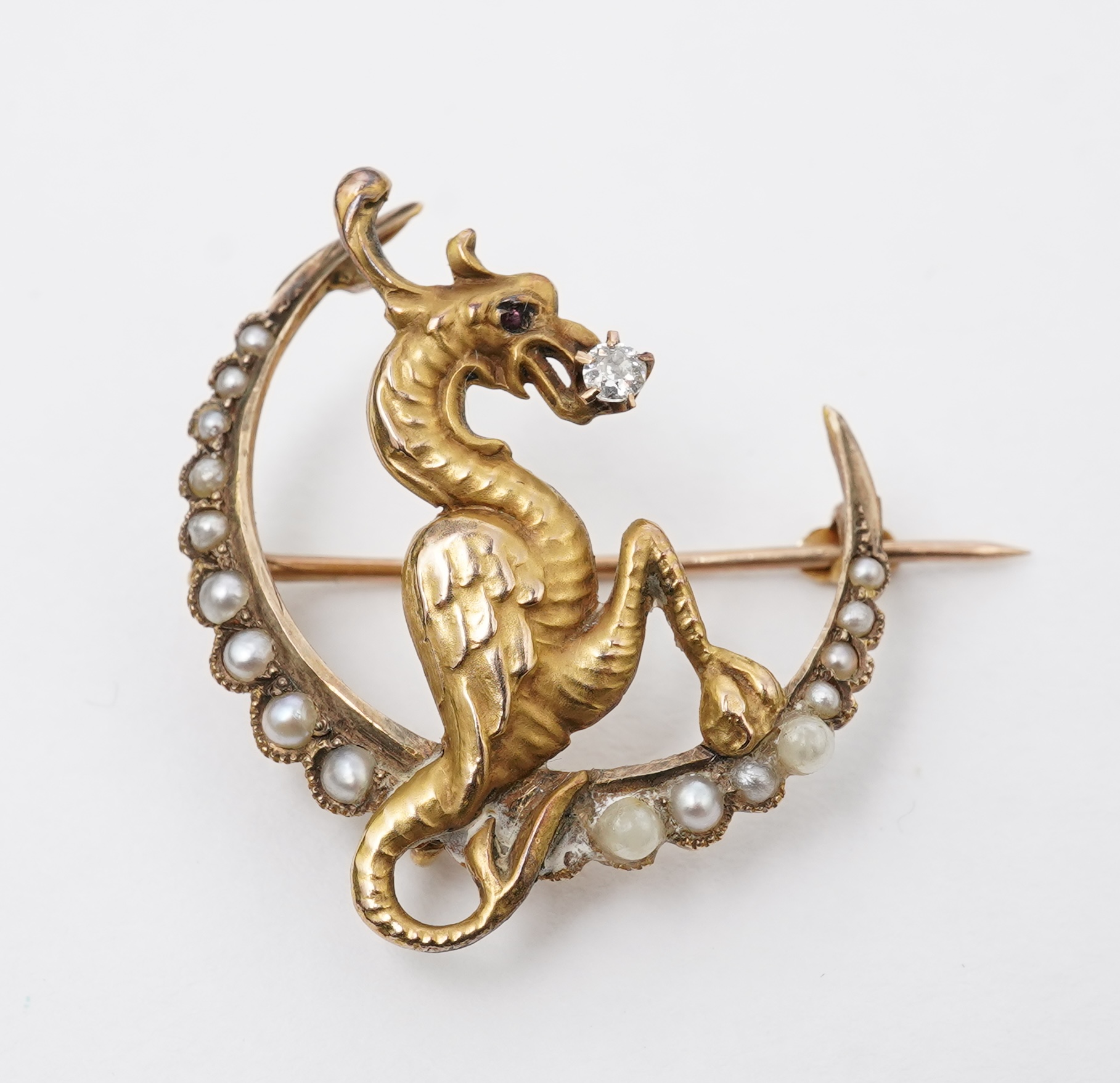 An Art Nouveau pearl and diamond brooch, early 20th century